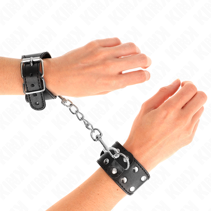KINK - CINTURINI CON DOPPIA LINEA DI BORCHIE REGOLABILI NERO – Sistemare le manette